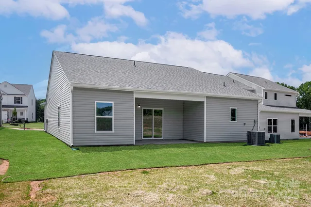 a view of a house with a garden