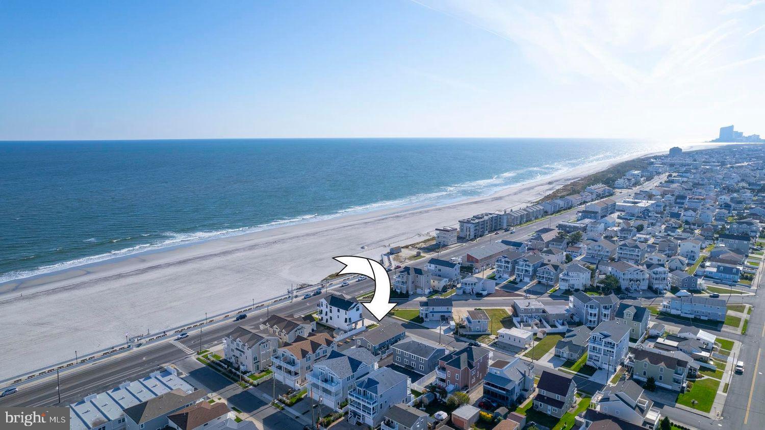 229 10th Street North, Unit 2 Brigantine, NJ 08203 - Photo 22 of 24 a view of an outdoor space with seating area