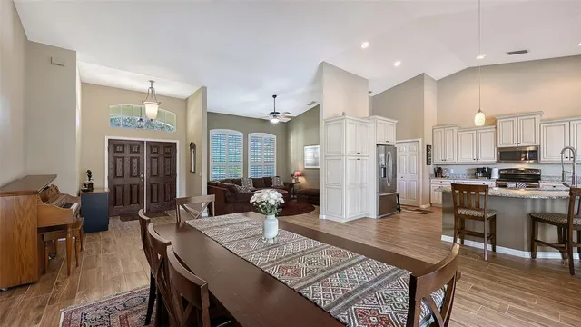 a bathroom with a sink and a painting on the wall