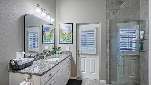 a view of a house with backyard porch and sitting area