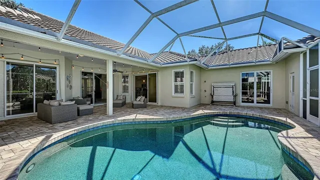 a view of a lake with a swimming pool