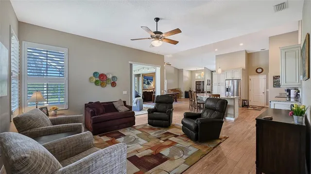 a view of a house with a tree in a yard