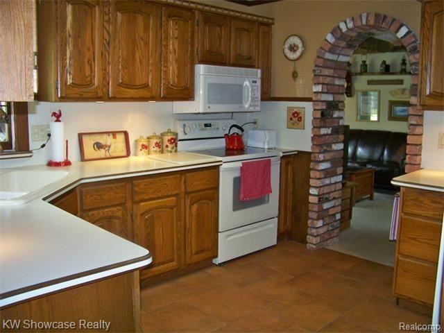 47200 West 11 Mile Road Novi, MI 48374 - Photo 29 of 62 Cozy Kitchen, Original Brick Arch Ways! Appliances Included