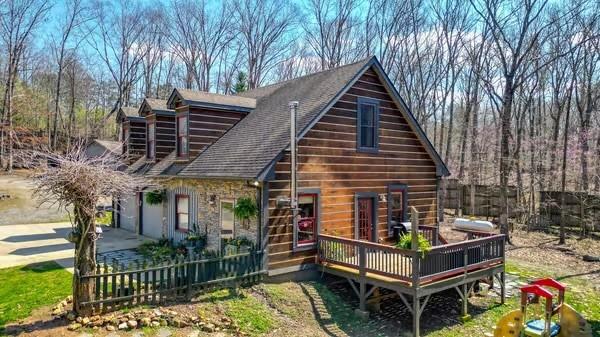 3981 Copperhead Road Southeast Acworth, GA 30102 - Photo 1 of 1 front view of a house with a balcony
