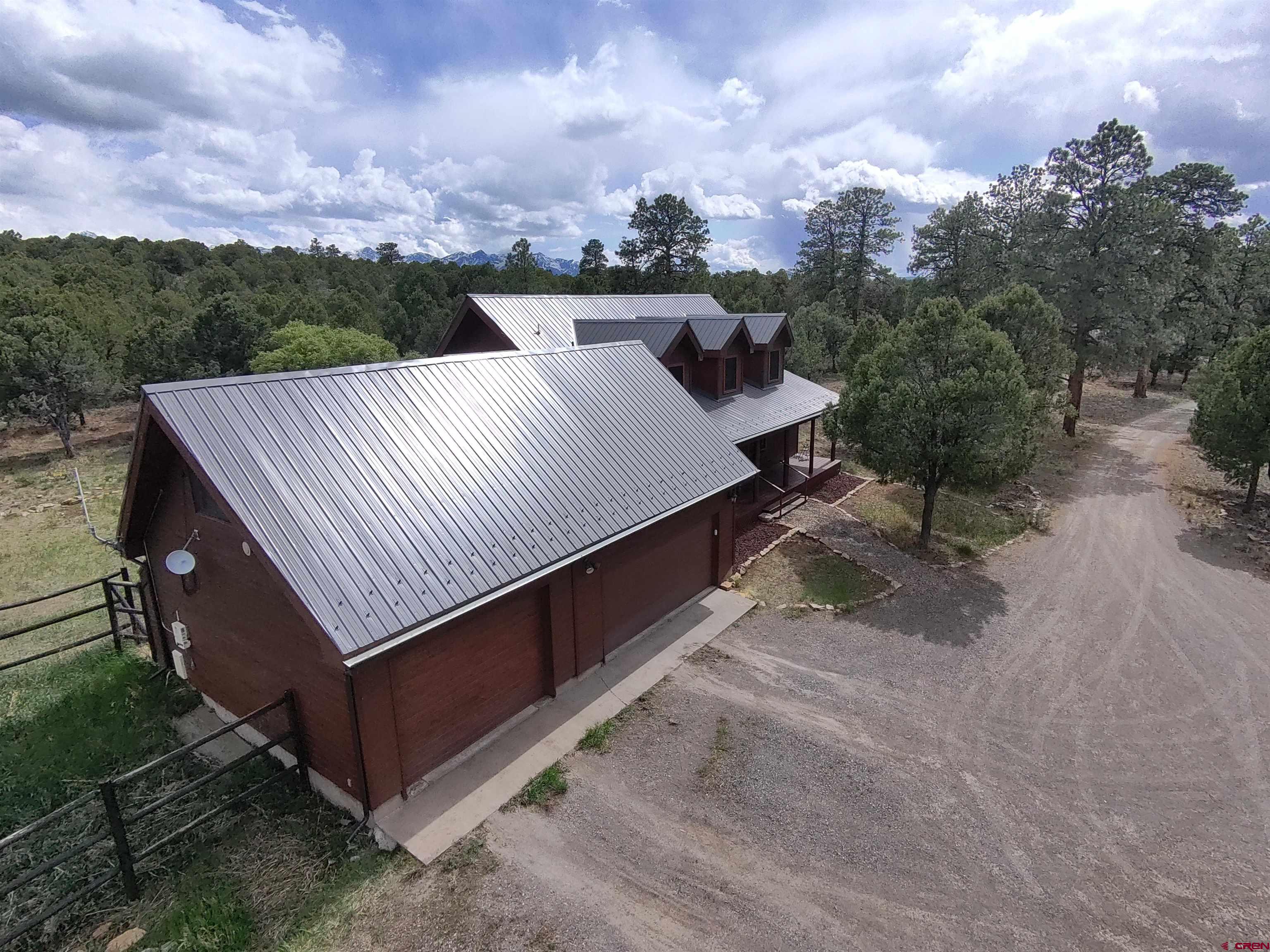 1010 Canyon Drive Ridgway, CO 81432 - Photo 2 of 38 a view of a terrace with a yard