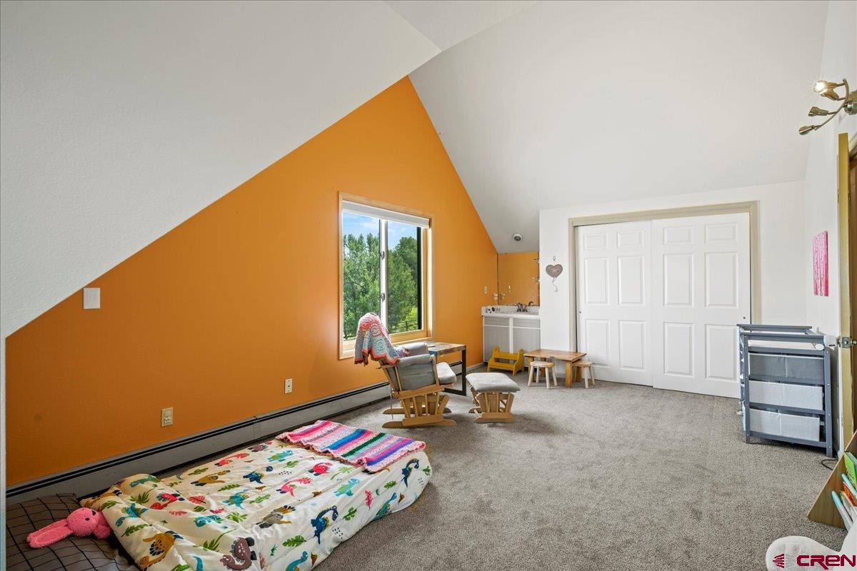 1010 Canyon Drive Ridgway, CO 81432 - Photo 24 of 38 a very nice looking room with a big bed