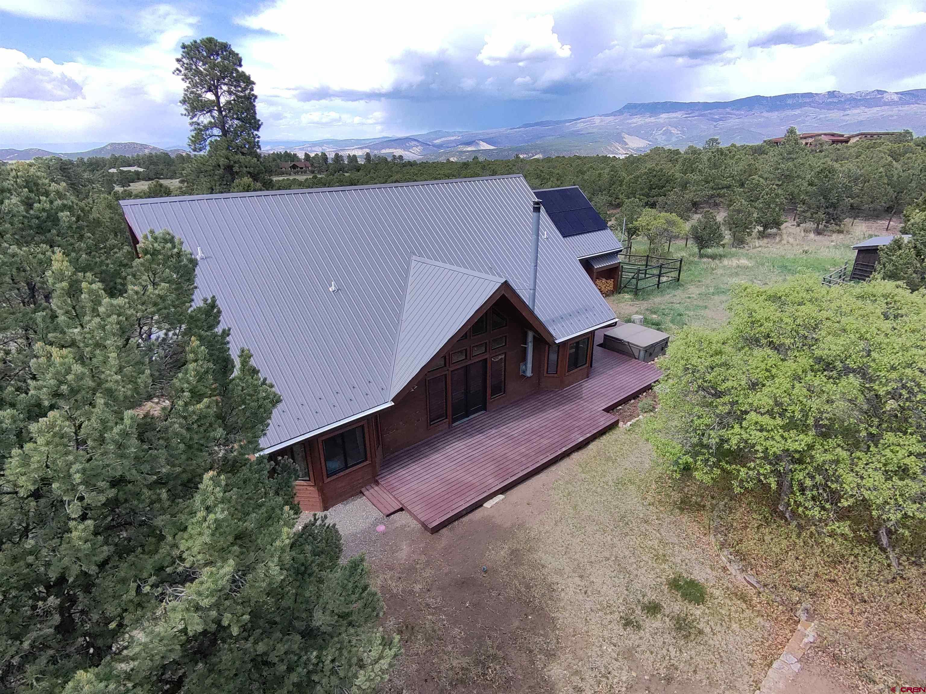 1010 Canyon Drive Ridgway, CO 81432 - Photo 35 of 38 an aerial view of a house with a yard