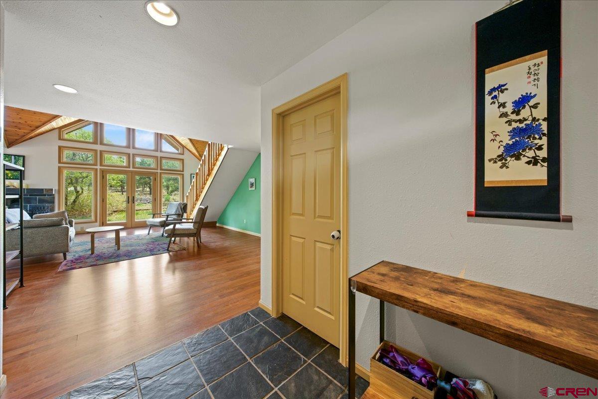 1010 Canyon Drive Ridgway, CO 81432 - Photo 6 of 38 a hallway with a large window
