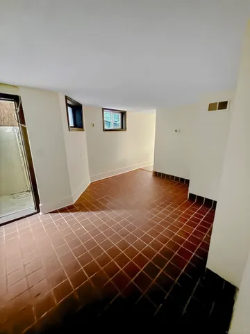 a view of a livingroom with wooden floor