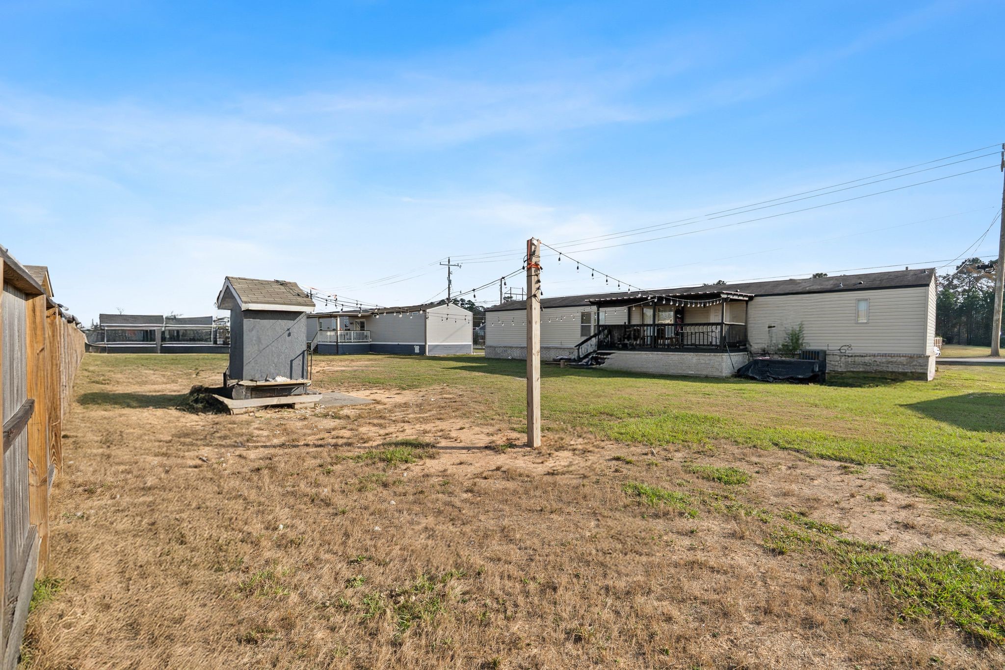 14633 Forest Tower Court Conroe, TX 77306 - Photo 24 of 25 a swimming pool with a yard