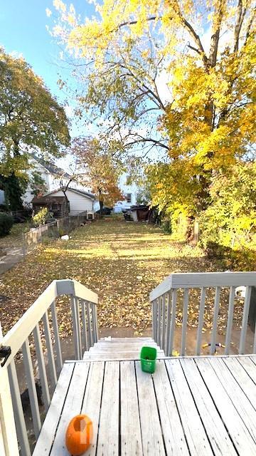 47 Richardson Street New Brunswick, NJ 08901 - Photo 11 of 11 a view of a balcony with wooden floor and fence