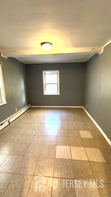 47 Richardson Street New Brunswick, NJ 08901 - Photo 3 of 11 a view of an empty room and window