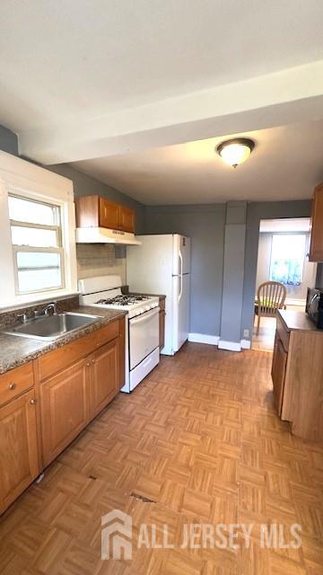 47 Richardson Street New Brunswick, NJ 08901 - Photo 4 of 11 a large kitchen with stainless steel appliances granite countertop a sink and cabinets