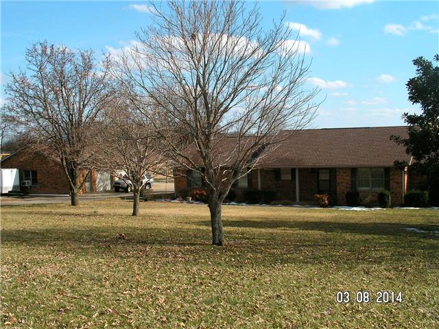 2600 Rossview Road Clarksville, TN 37043 - Photo 2 of 20 front yard mature trees