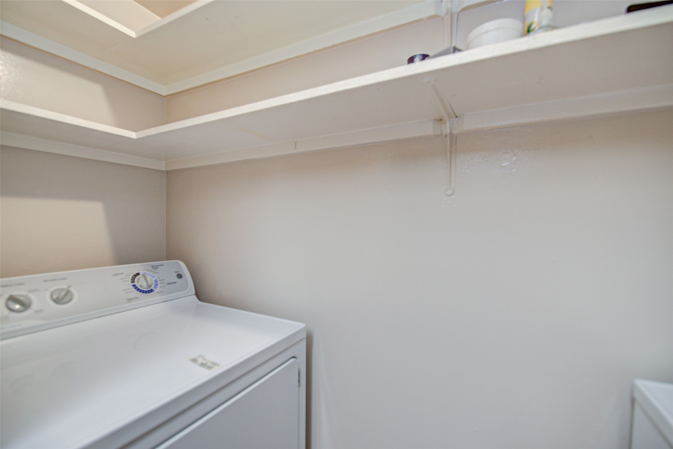 3525 Sage Road, Unit 407 Houston, TX 77056 - Photo 21 of 45 Compact Laundry closet side by side washer & dryer