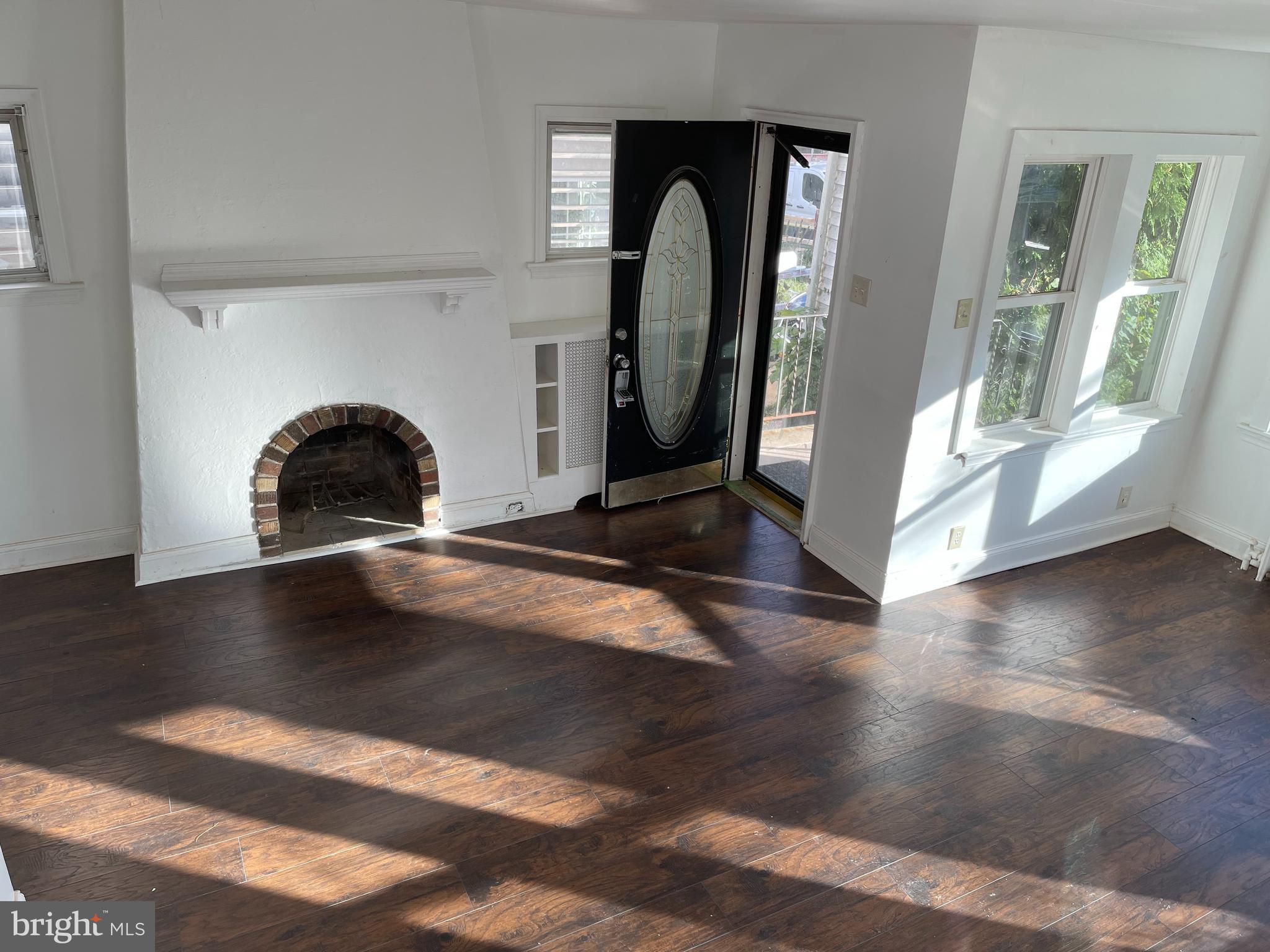 7771 Parkview Road Upper Darby, PA 19082 - Photo 2 of 21 Livingroom with Wood Burning Fireplace