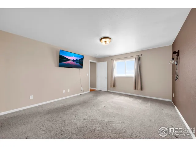 a bathroom with a sink a mirror and a shower
