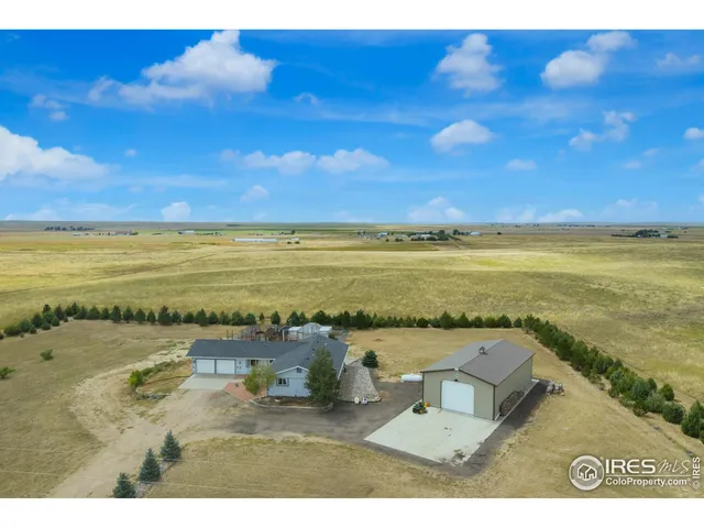 a view of large house with a big yard