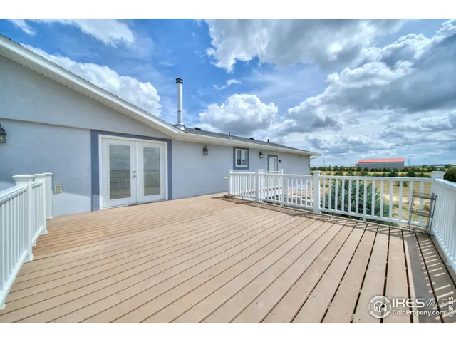 a view of a town with big trees