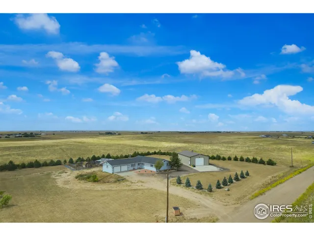 a view of a swimming pool with an outdoor space