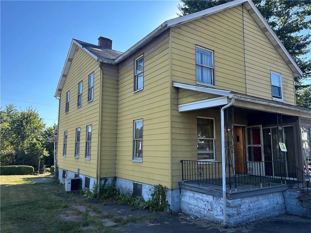 102 East 2nd Street Grindstone, PA 15442 - Photo 18 of 20 a view of a house with a yard and sitting area