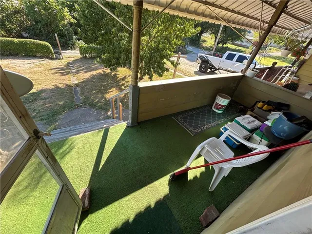 a view of swimming pool from a balcony