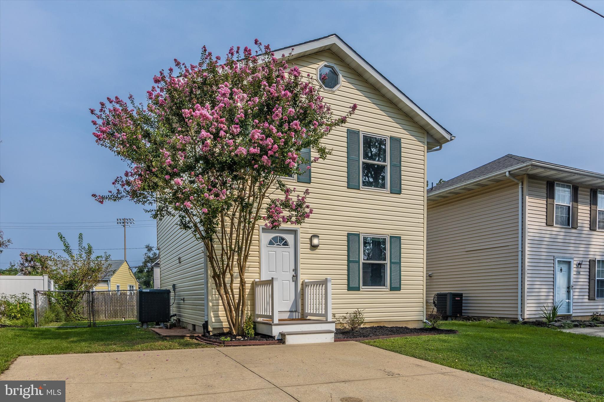 1702 Potomac Road Edgewater, MD 21037 - Photo 20 of 41 a front view of a house with a yard