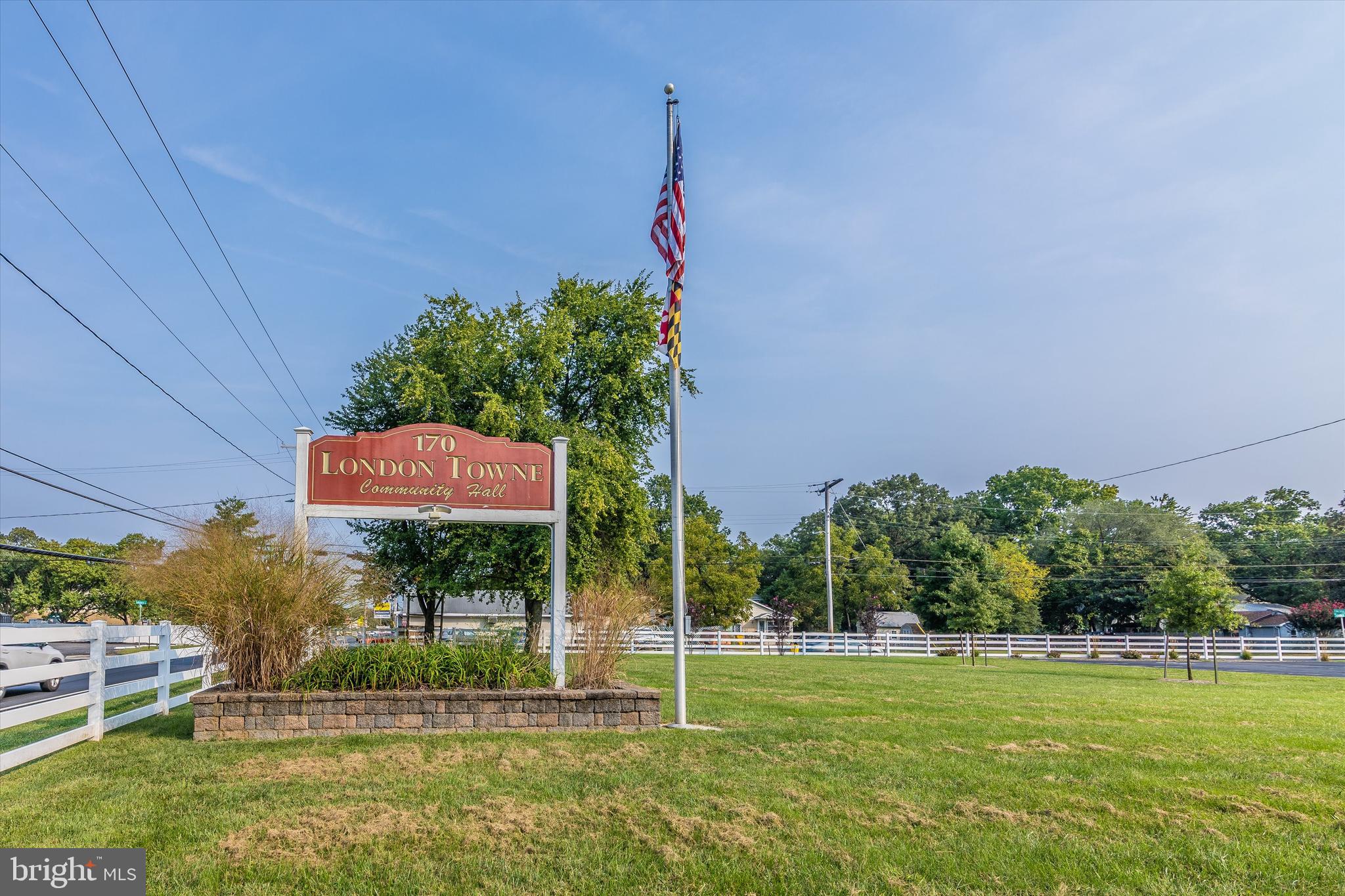 1702 Potomac Road Edgewater, MD 21037 - Photo 21 of 41 a sign board with tall trees in the background
