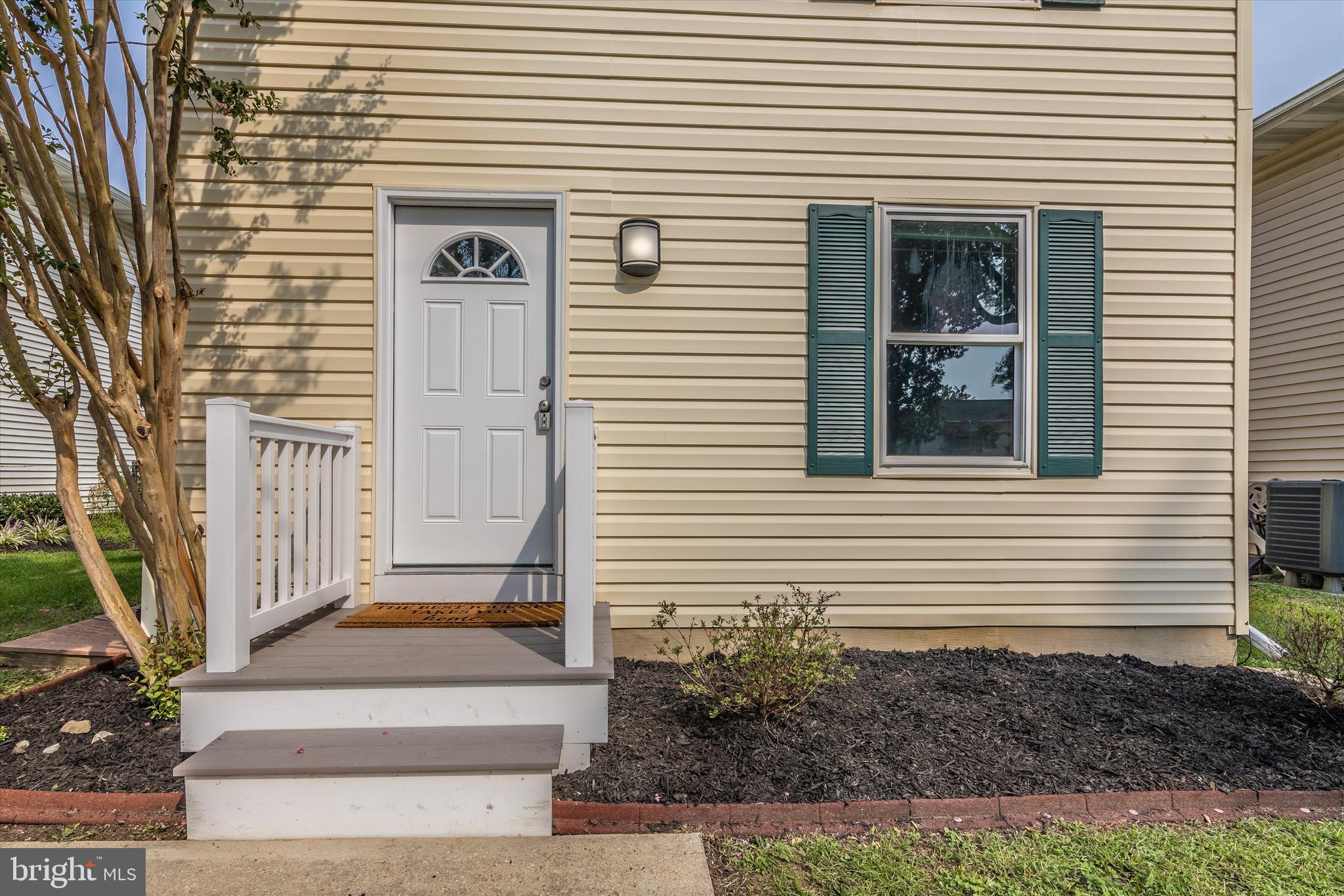 1702 Potomac Road Edgewater, MD 21037 - Photo 25 of 41 a front view of a house with a yard