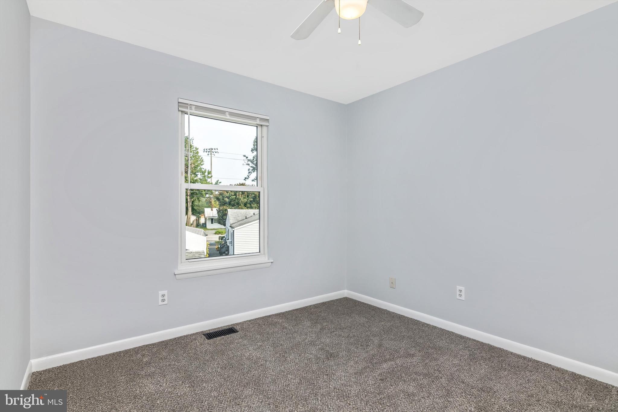 1702 Potomac Road Edgewater, MD 21037 - Photo 34 of 41 an empty room with a window