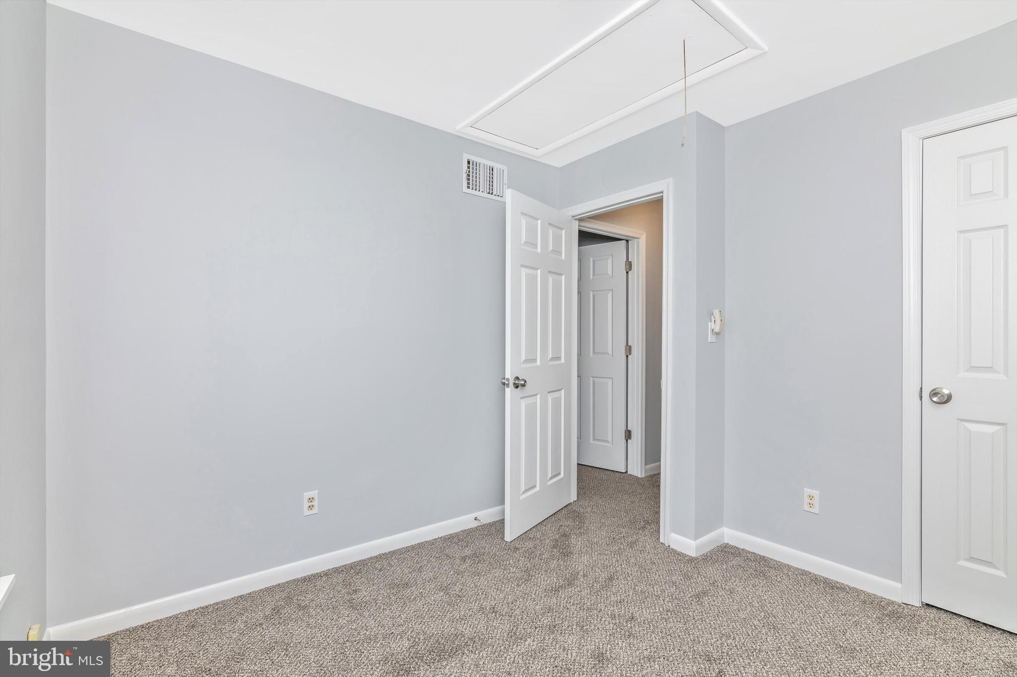1702 Potomac Road Edgewater, MD 21037 - Photo 37 of 41 a view of an empty room with closet and a window