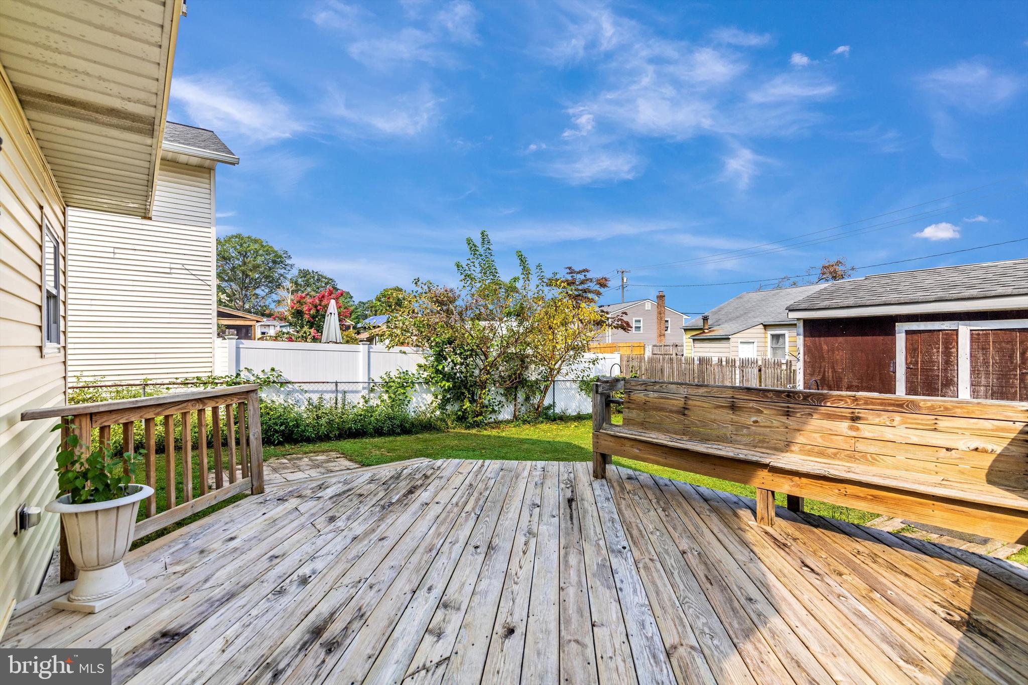 1702 Potomac Road Edgewater, MD 21037 - Photo 9 of 41 a view of a deck with a yard