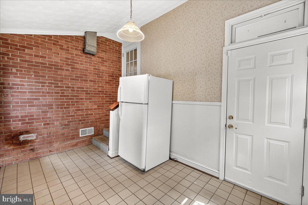 15016 Timberlake Drive Silver Spring, MD 20905 - Photo 16 of 46 Mudroom area off the garage leading into kitchen