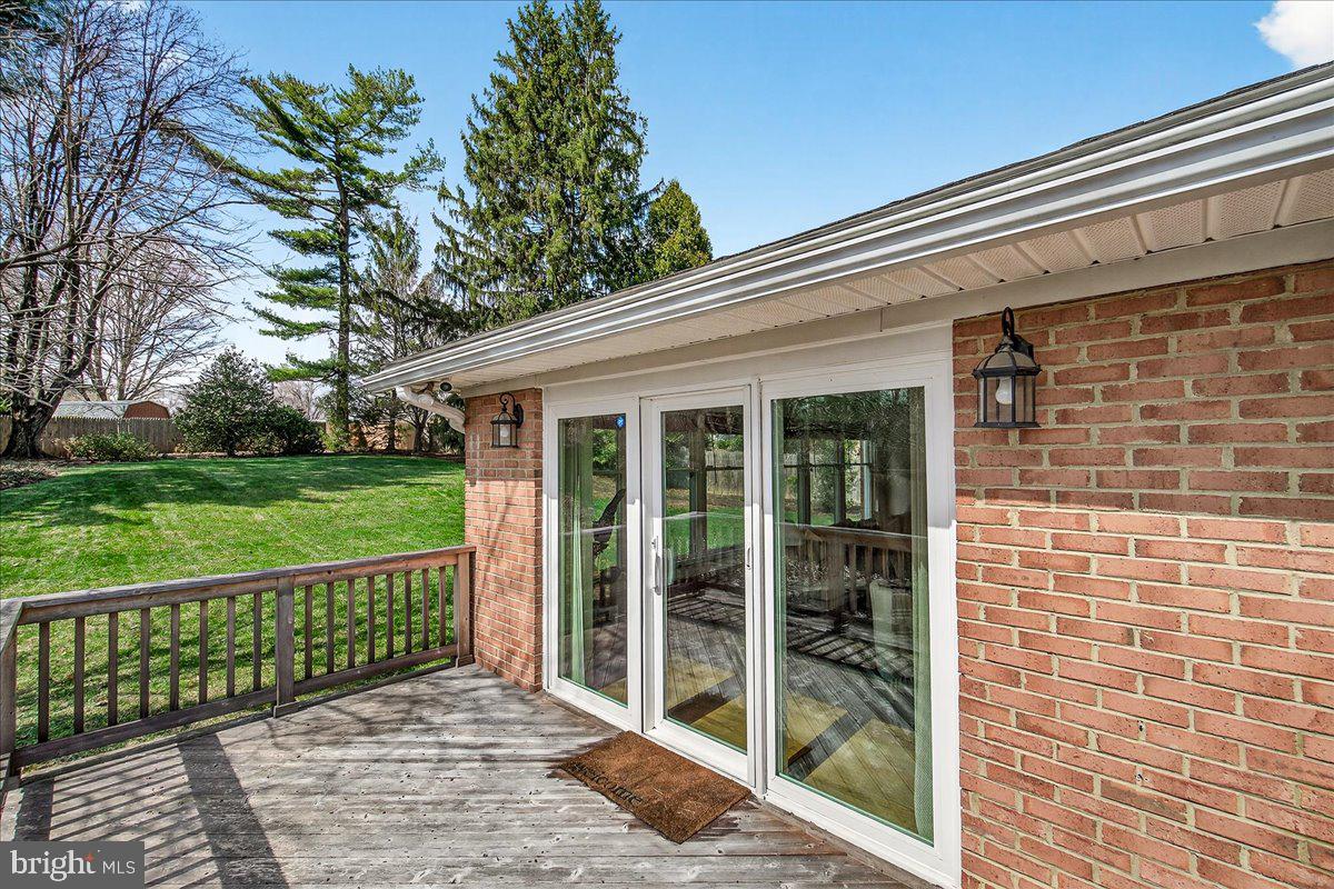 15016 Timberlake Drive Silver Spring, MD 20905 - Photo 23 of 46 Deck off the sunroom