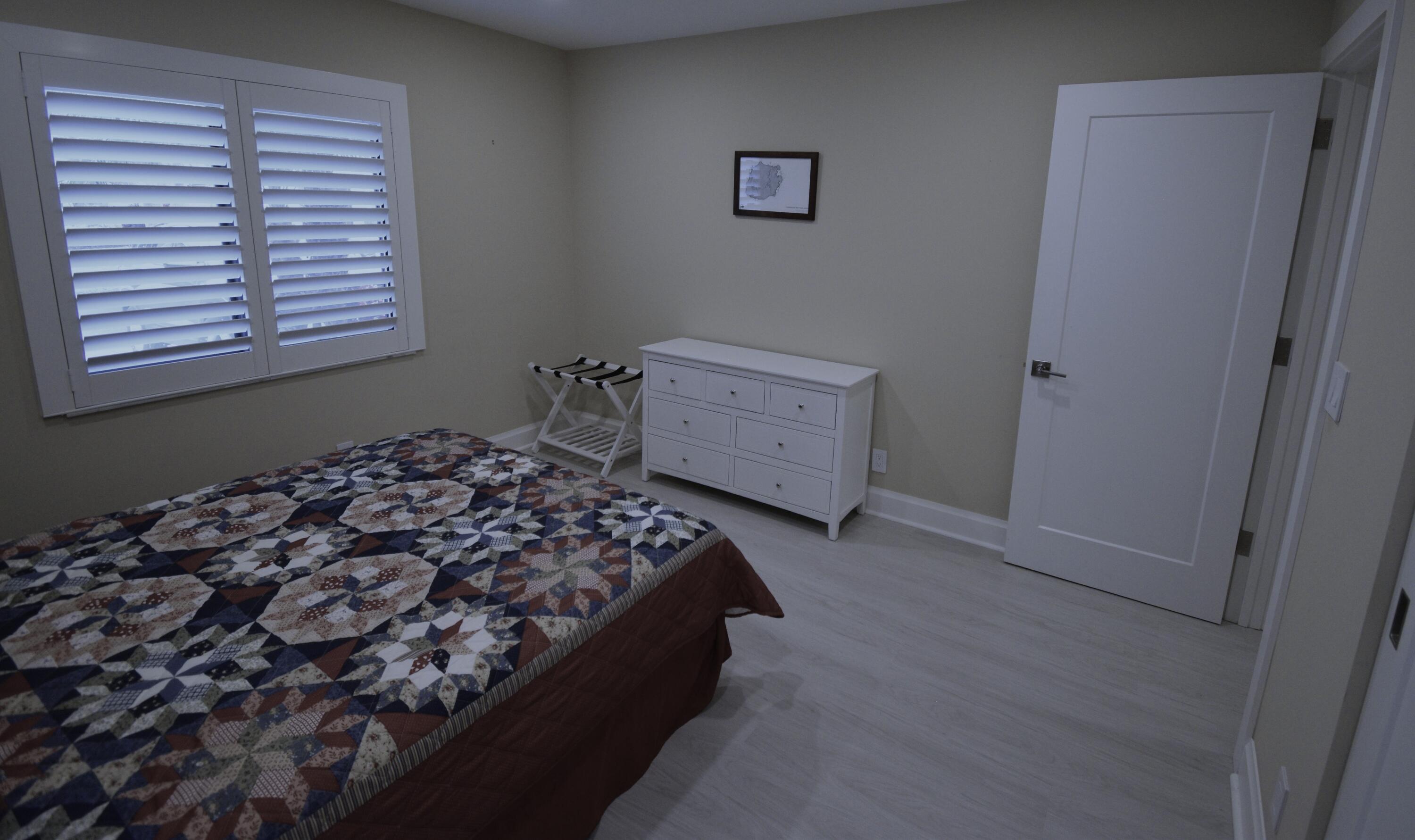 8103 Songbird Terrace Boca Raton, FL 33496 - Photo 26 of 39 a bed room with a bed and a window