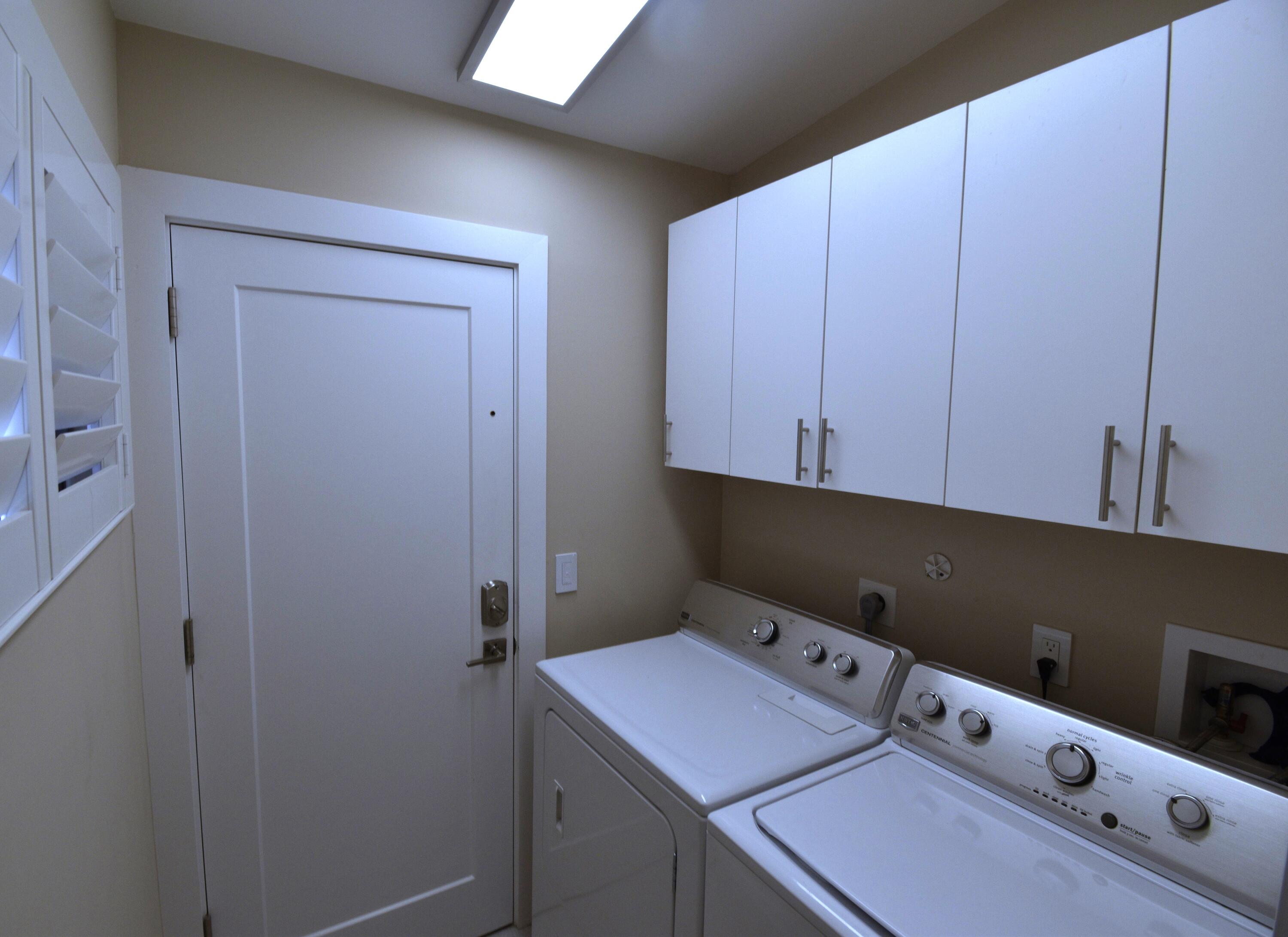 8103 Songbird Terrace Boca Raton, FL 33496 - Photo 27 of 39 a utility room with dryer and washer