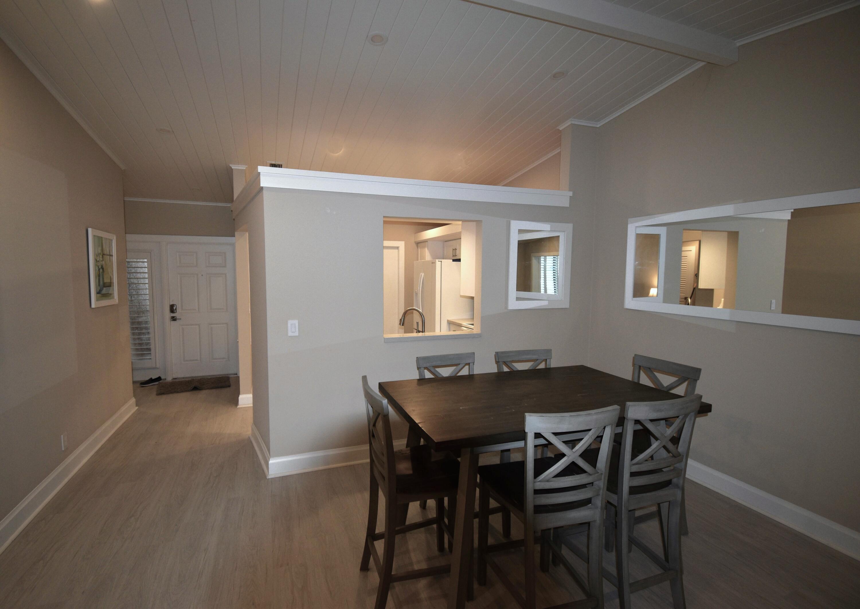 8103 Songbird Terrace Boca Raton, FL 33496 - Photo 8 of 39 a dining room with furniture and window