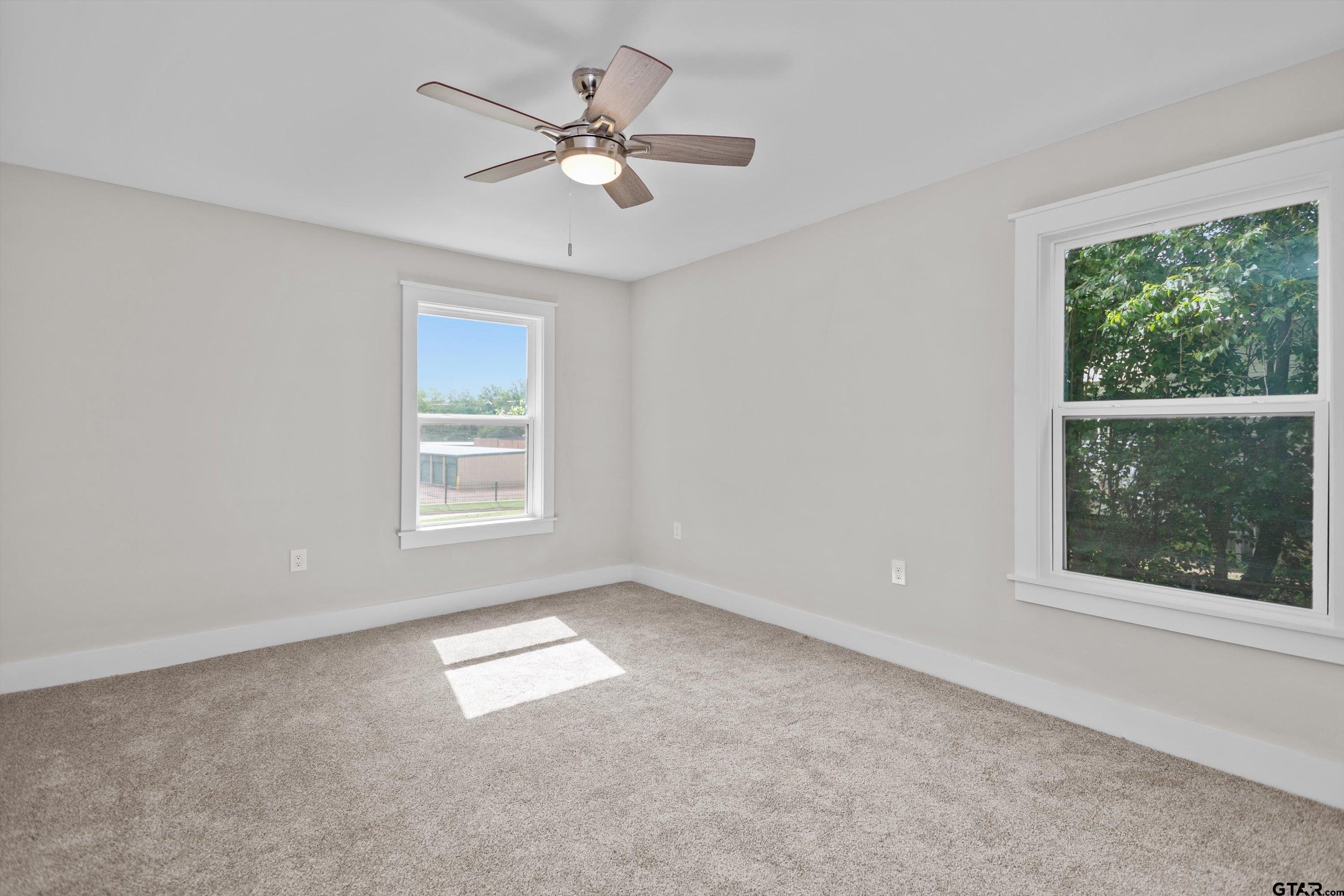 601 North 4th Street Crockett, TX 75835 - Photo 13 of 25 an empty room with a window
