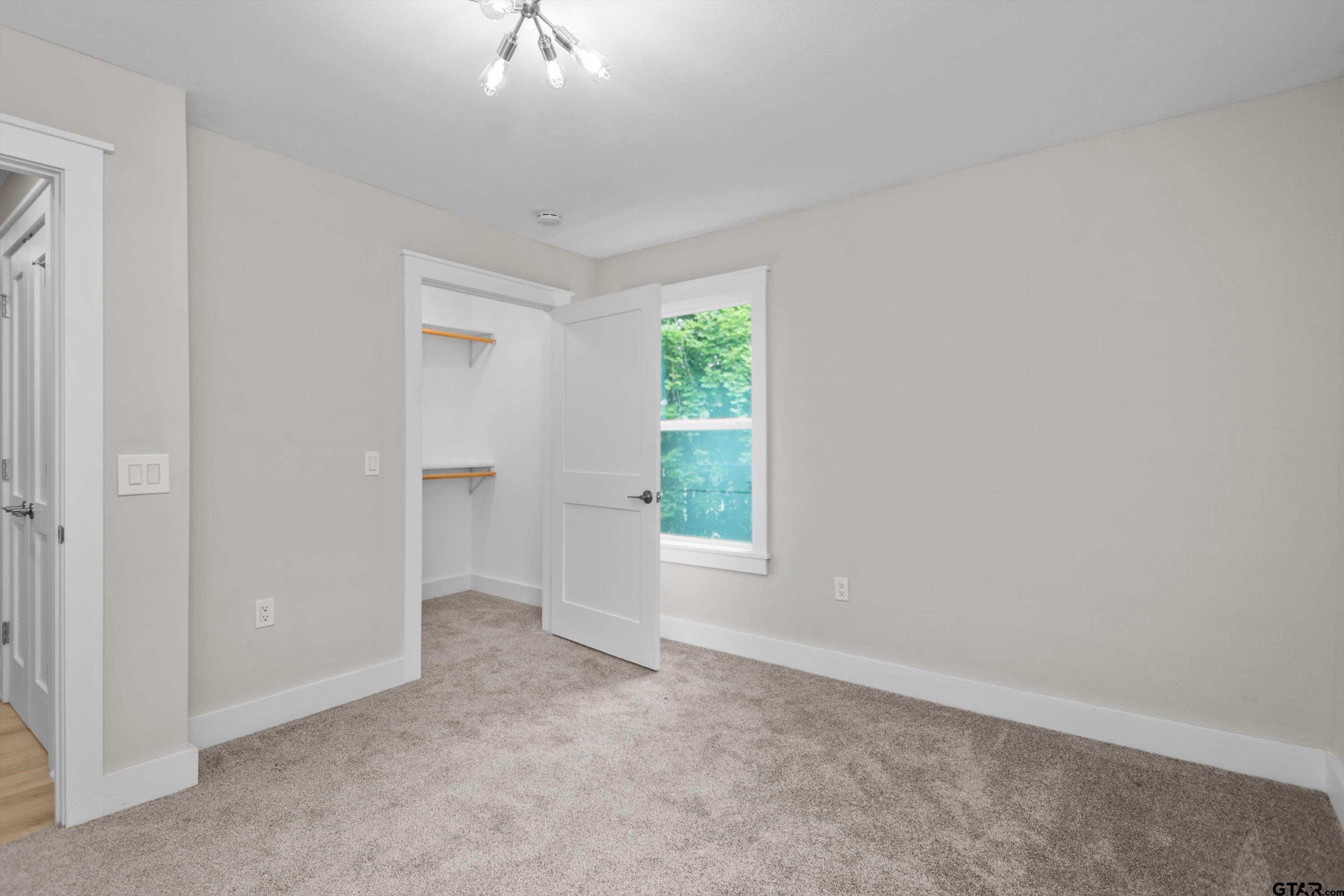 601 North 4th Street Crockett, TX 75835 - Photo 14 of 25 a view of an empty room with a window
