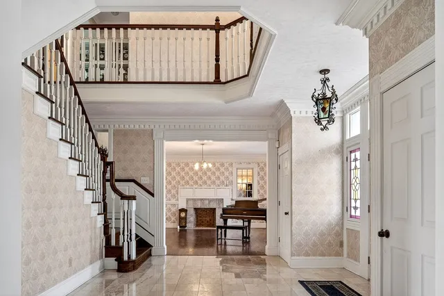 a view of fireplace and wooden floor