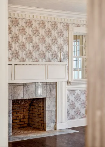 a kitchen with stainless steel appliances granite countertop wooden cabinets a sink and a stove