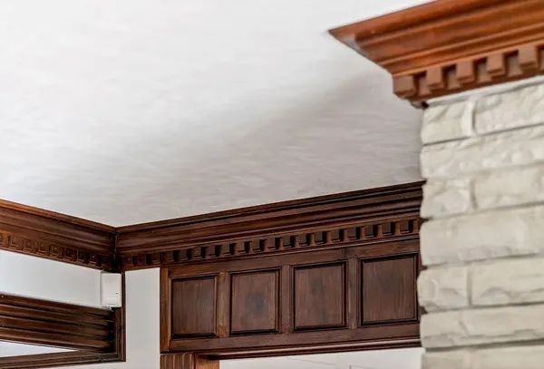 a view of staircase with white walls and a window