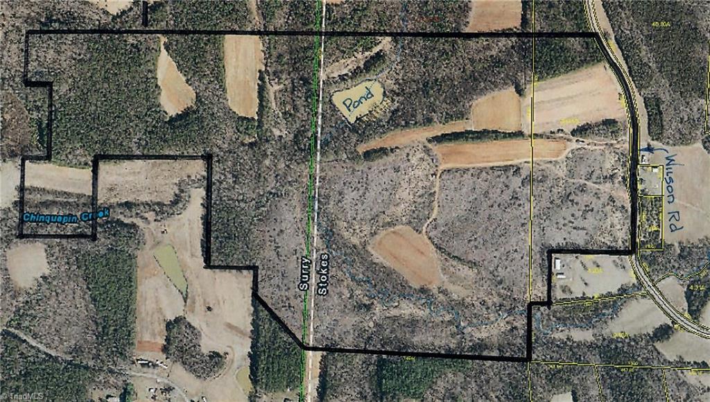 Aerial of a great farm property.  Fields and a big pond