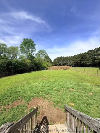 a view of a lake with a big yard
