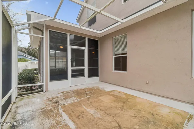 a aerial view of a house with swimming pool and big yard