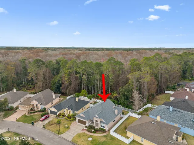 a view of a swimming pool with an outdoor space and seating