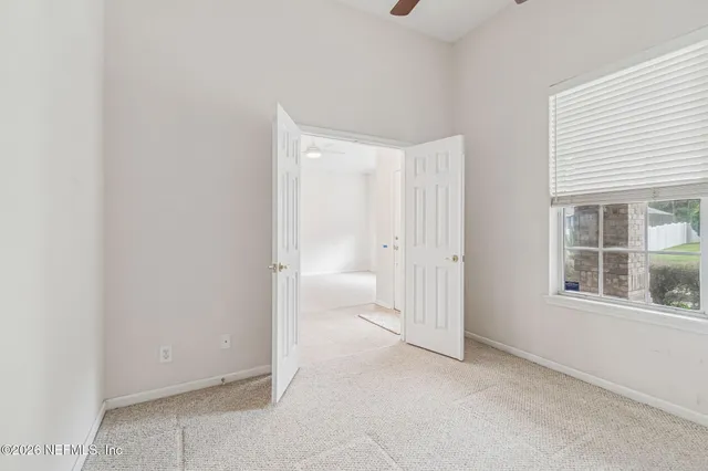 a view of a kitchen with a sink cabinets and a fireplace