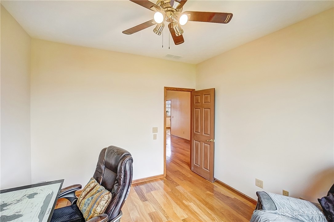 1540 Jasper Road Xenia, OH 45385 - Photo 26 of 91 This versatile room features warm hardwood flooring, ready for your personalized touch and daily routines.