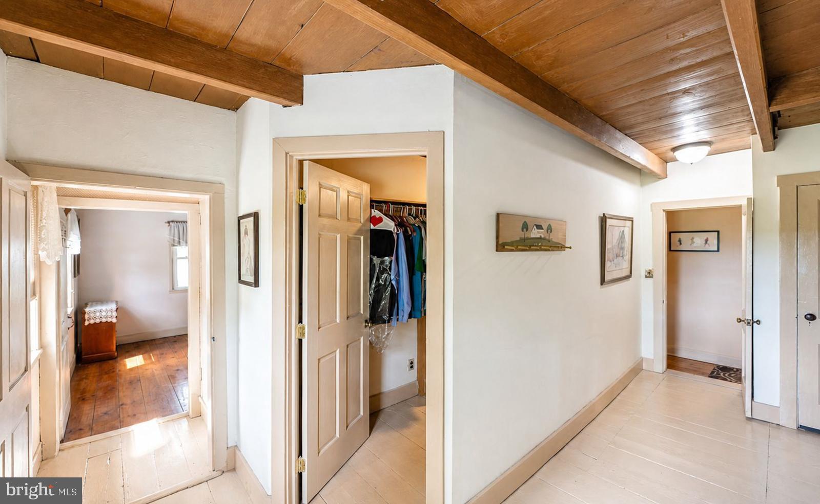 222 Blue School Road Perkasie, PA 18944 - Photo 40 of 77 a view of a hallway with a livingroom and a couch