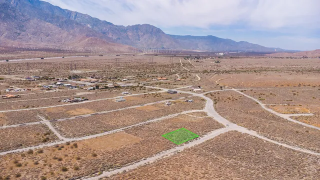 a view of an ocean and a mountain